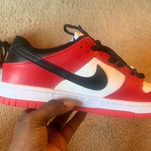SB dunks black and red.